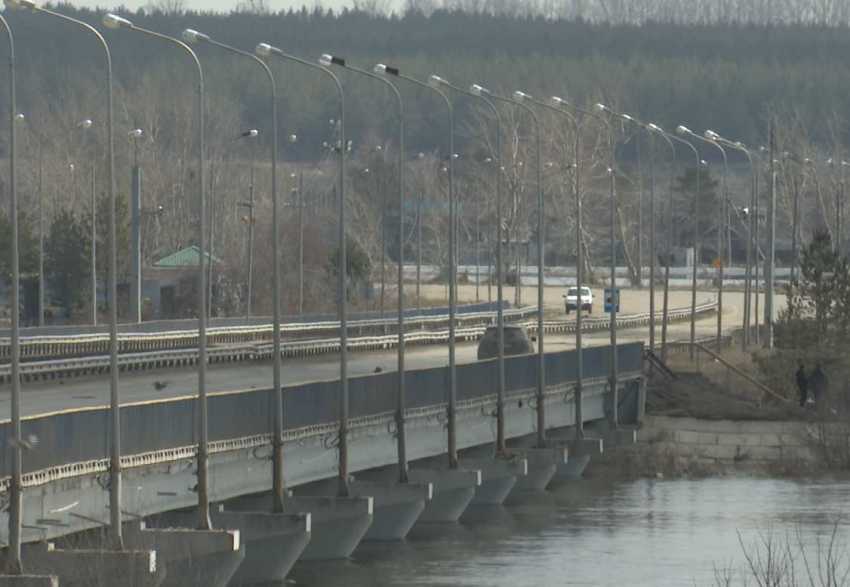 Фотография для новости Последствия паводка. Когда откроют мост в районе КЖБИ?